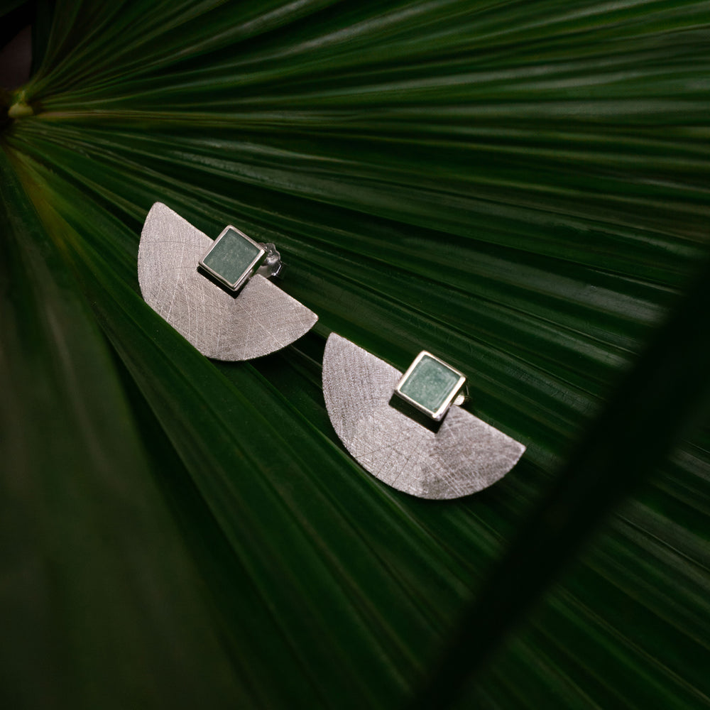 
                      
                        Moonlit Mirage Stud Earrings
                      
                    